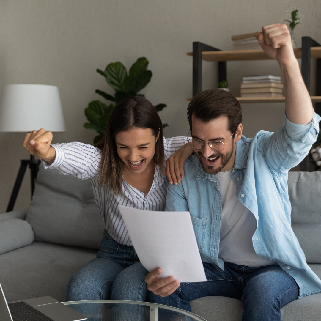 Happy clients celebrating a successful claim